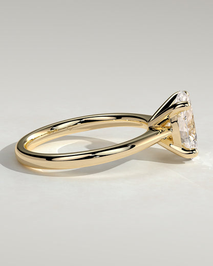 Emily - Oval Claw Solitaire with Pinched Tapered Band and Cathedral Low Setting Engagement Ring - Yellow Gold