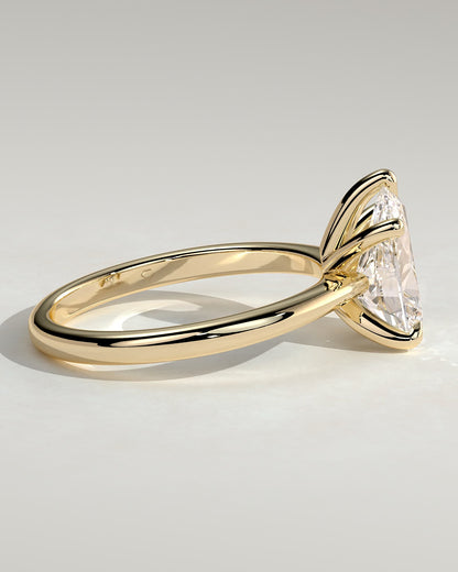Aspen - Pear Claw Solitaire with Pinched Tapered Band and Cathedral Low Setting Engagement Ring - Yellow Gold