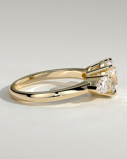 Halle - Round Claw Trilogy with Pear Side Stones and Knife Edge Band Engagement Ring - Yellow Gold