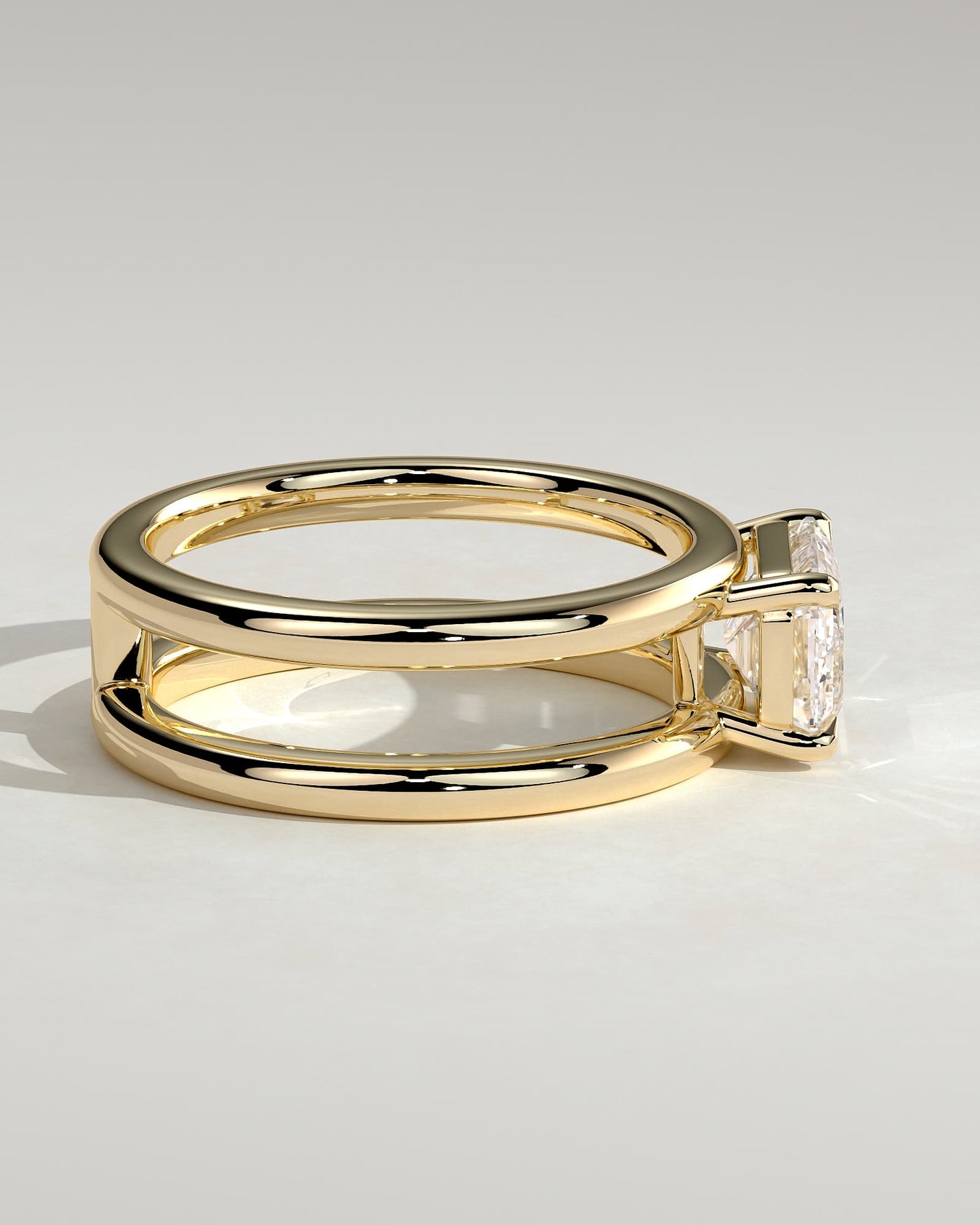 Devon - Emerald East West Claw Solitaire with Spaced Double Band Engagement Ring - Yellow Gold