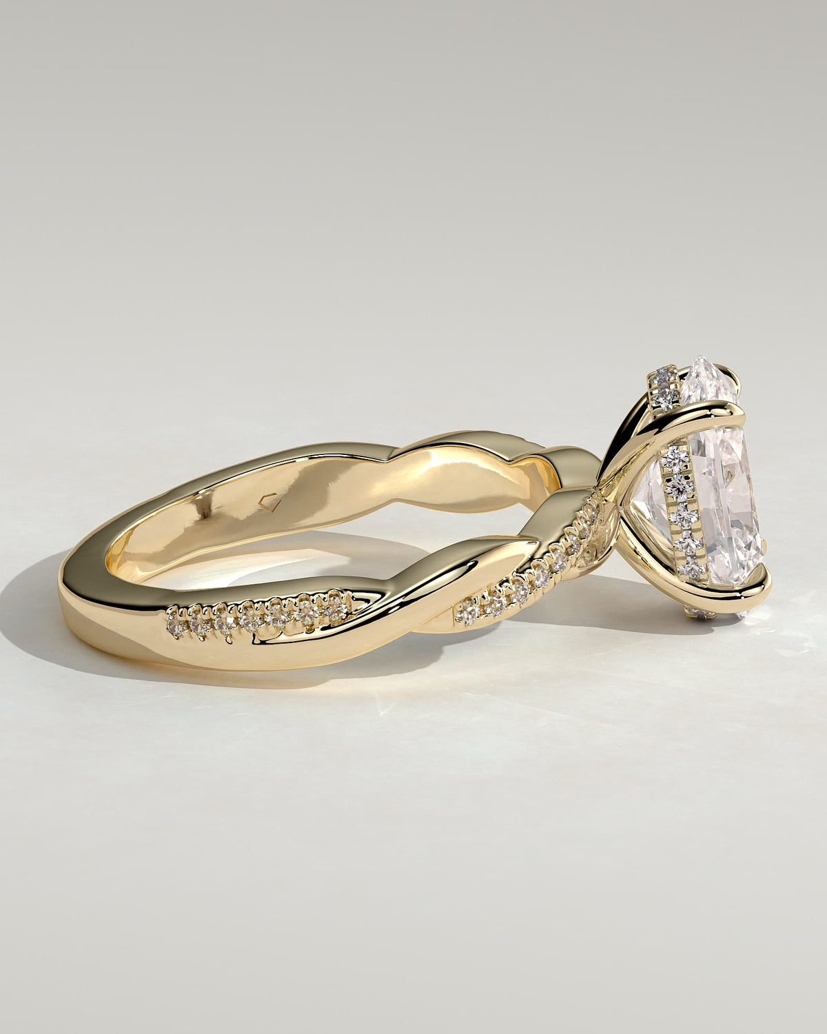 Lara - Oval Claw Solitaire with Hidden Halo and Twisted Alternating Pave Band Engagement Ring - Yellow Gold