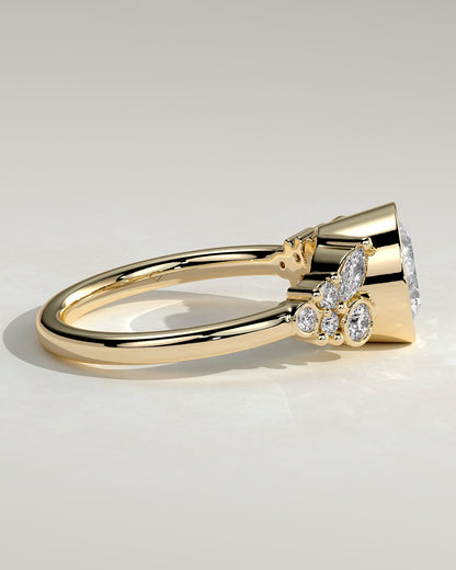 Alessia - Round Bezel Solitaire with Clustered Round-Marquise Mixed Set Shoulder Stones Engagement Ring - Yellow Gold