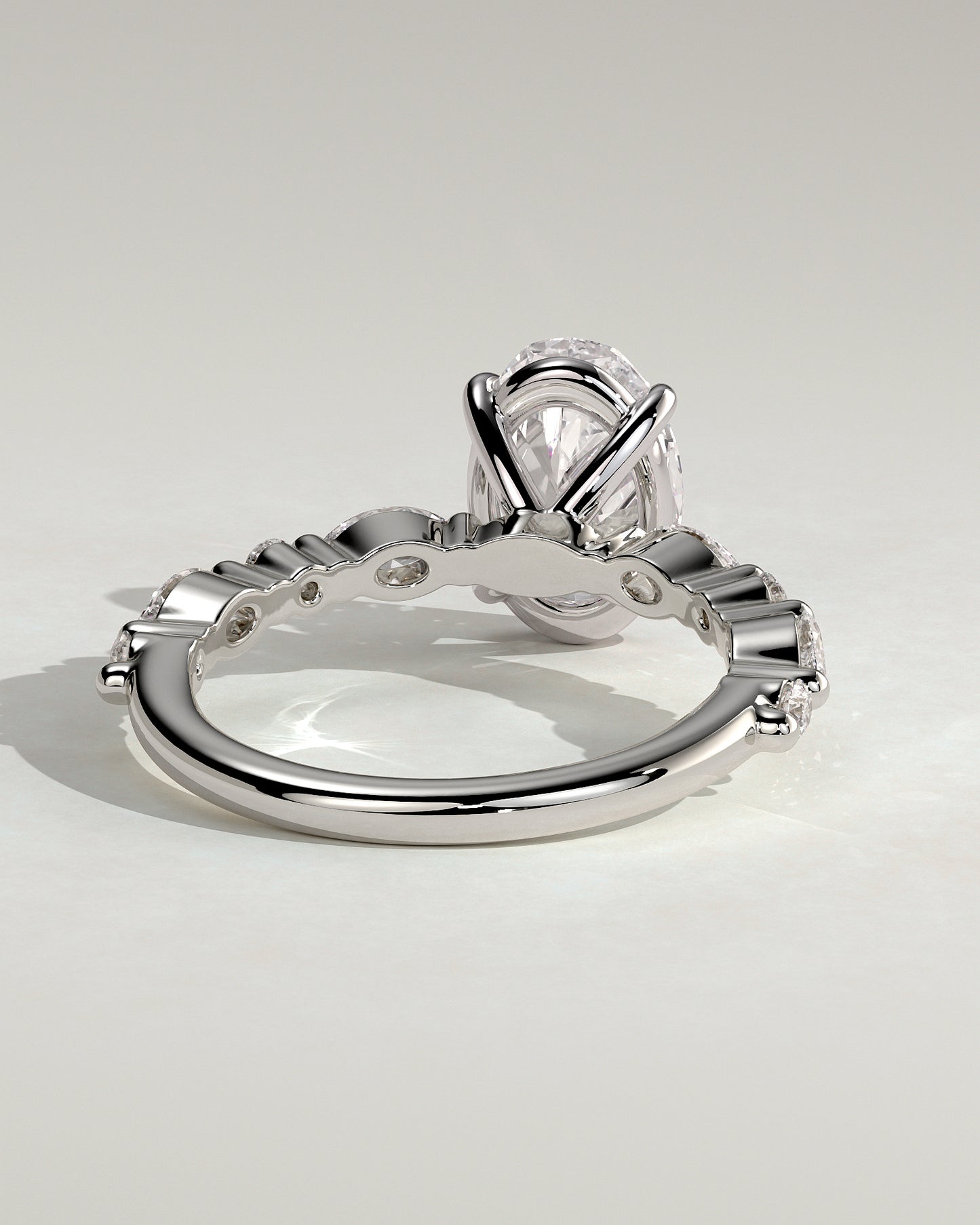 Alyssa - Oval Claw Solitaire with Marquise and Round Accent Stones Engagement Ring - Platinum - White Gold / Platinum 2ct