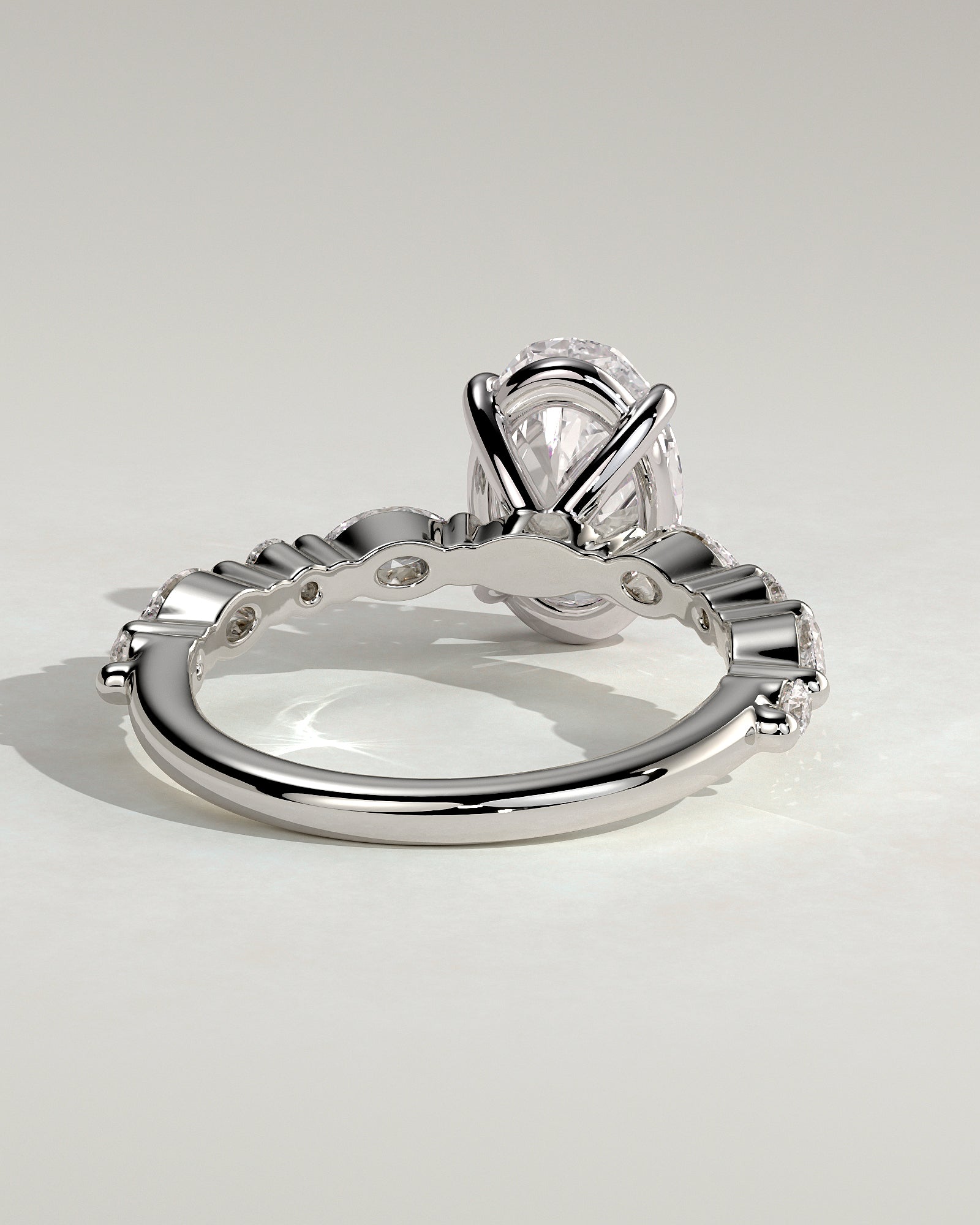 Alyssa - Oval Claw Solitaire with Marquise and Round Accent Stones Engagement Ring - Platinum - White Gold / Platinum 2ct