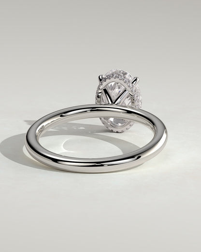 Cecilia - Oval Claw Solitaire with Wrap Around Hidden Halo Engagement Ring - White Gold