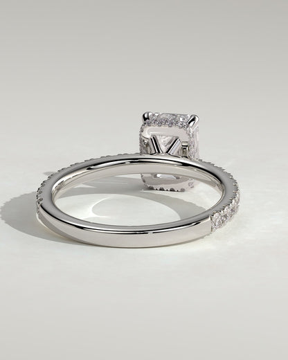 Eliana - Emerald Claw Solitaire with Wrap Around Hidden Halo and Pave Band Engagement Ring - Platinum