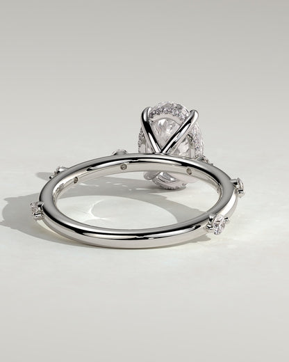 Elise - Oval Claw Solitaire with 6 Spaced Round Accent Stones and Hidden Halo Engagement Ring - White Gold