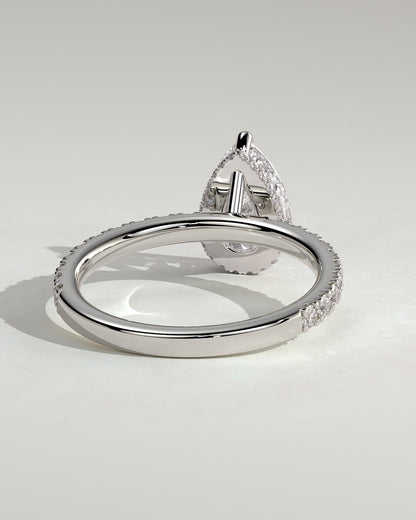 Keira - Pear Claw Solitaire with Wrap Around Hidden Halo and Pave Band Engagement Ring - White Gold