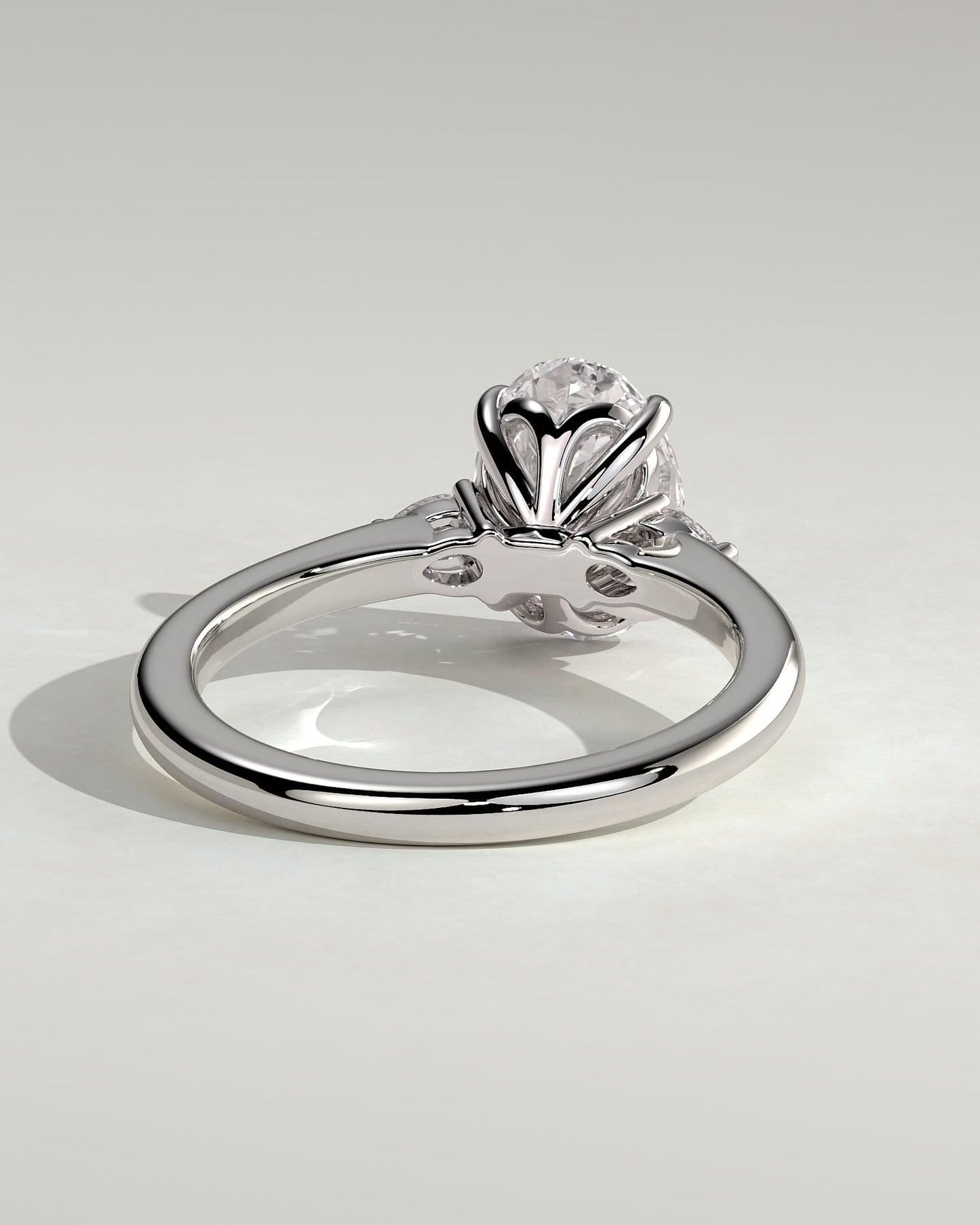 Elena - Oval Claw Trilogy with Pear Side Stones and Tulip Detail Engagement Ring - White Gold
