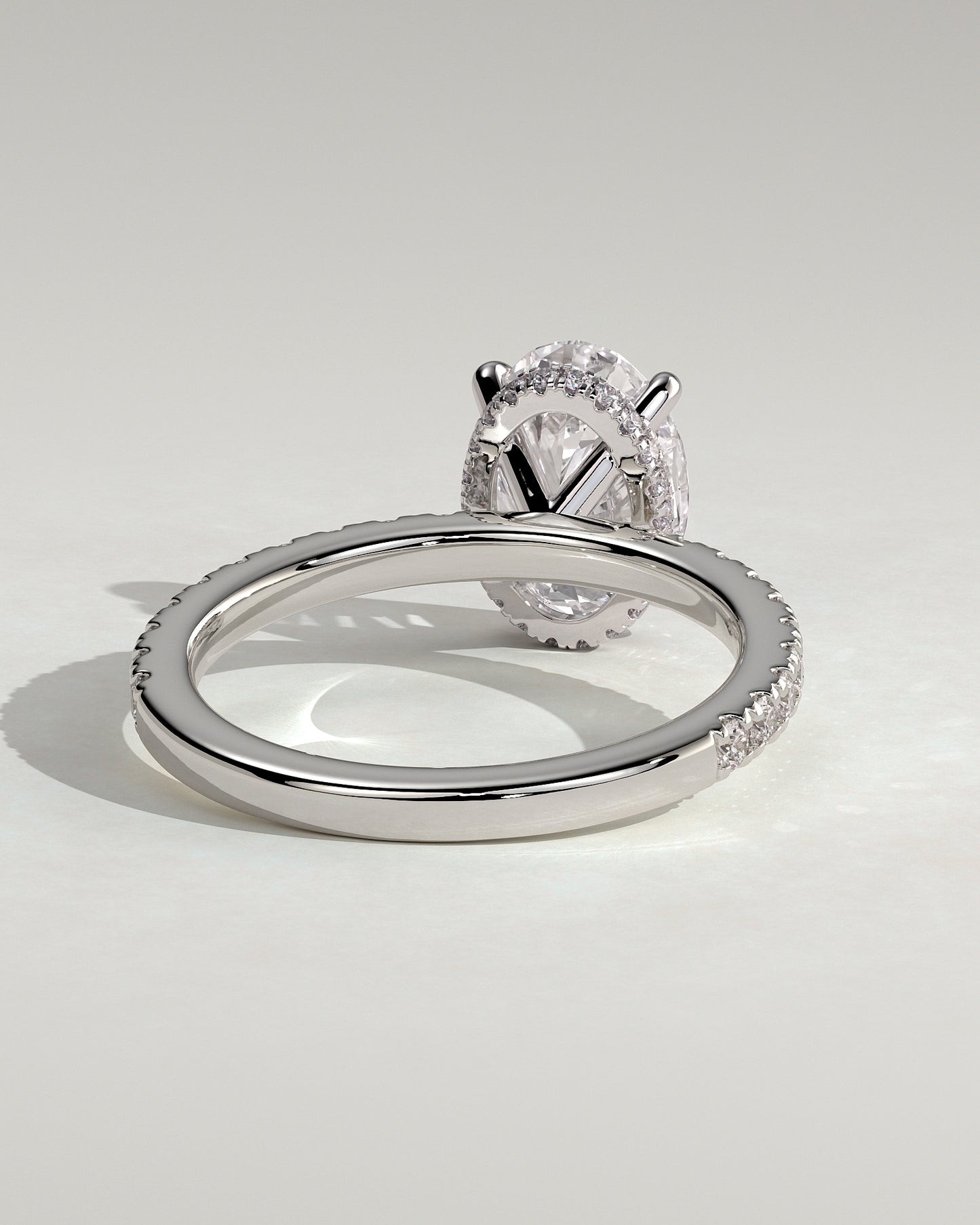 Evangeline - Oval Claw Solitaire with Wrap Around Hidden Halo and Pave Band Engagement Ring - Platinum - White Gold / Platinum 2ct