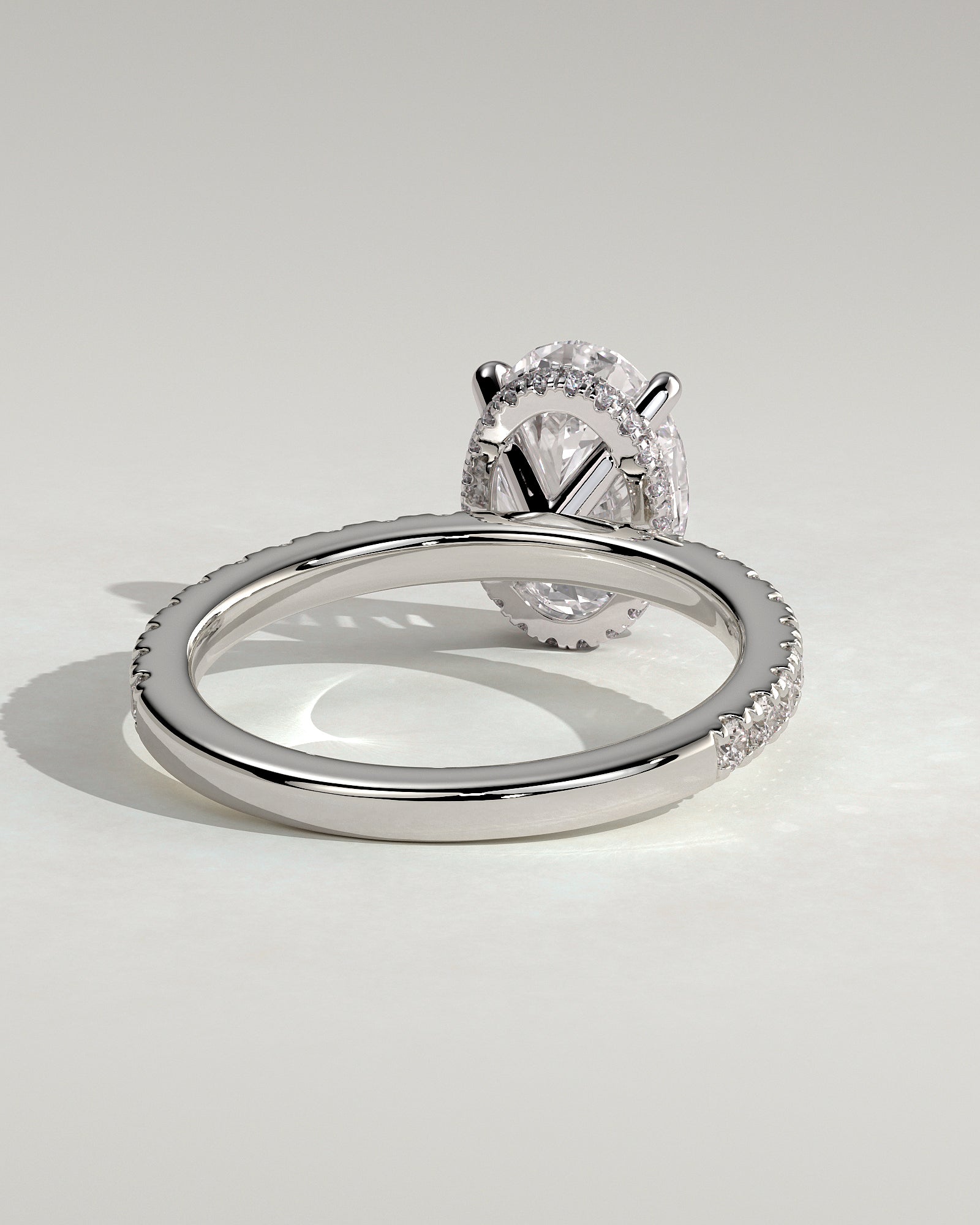 Evangeline - Oval Claw Solitaire with Wrap Around Hidden Halo and Pave Band Engagement Ring - Platinum - White Gold / Platinum 2ct