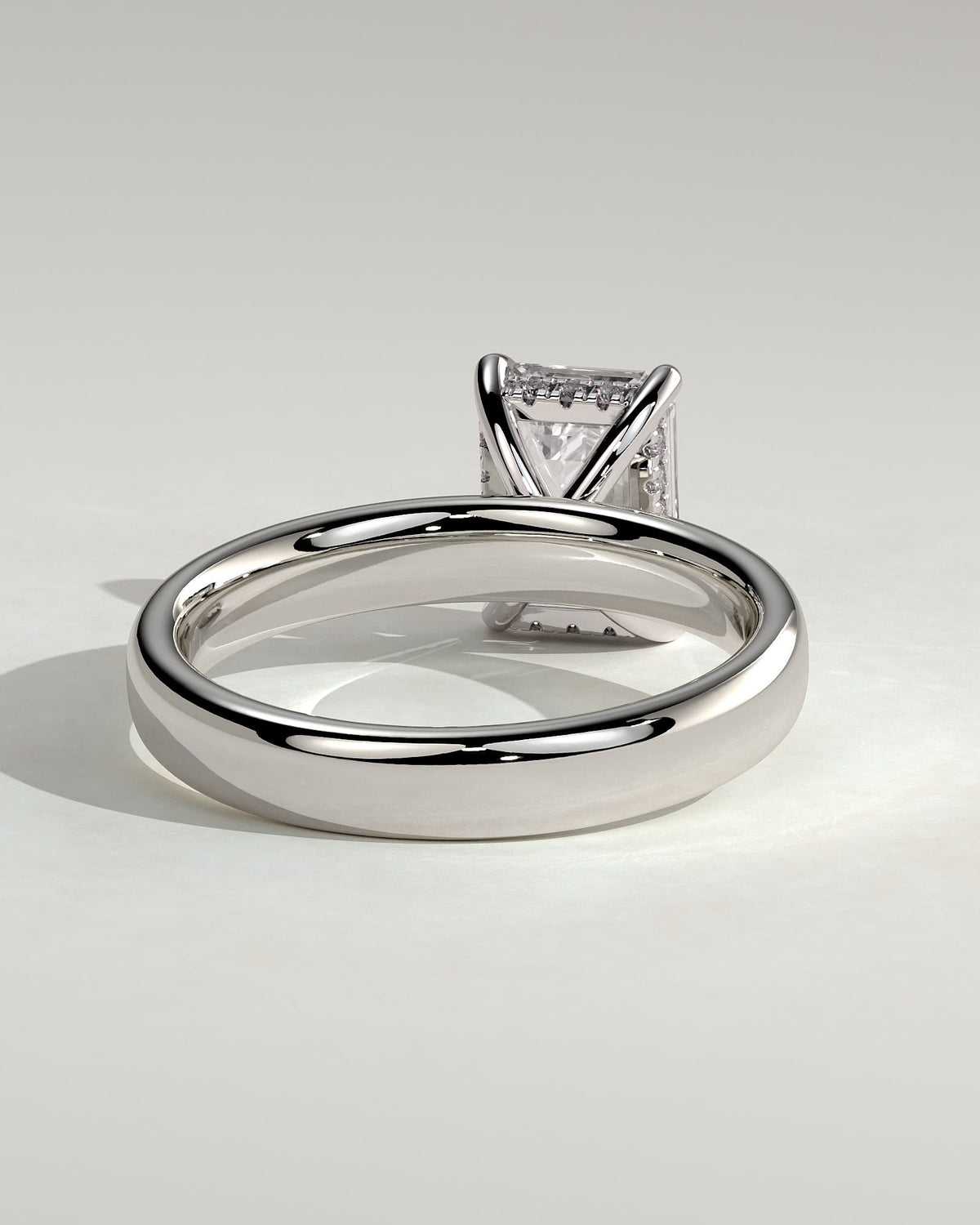 Kate - Emerald Claw Solitaire with Cigar Band and Hidden Halo Engagement Ring - Platinum