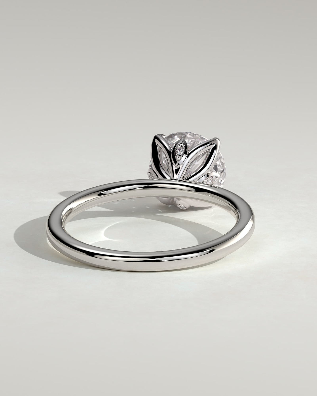 Joy - Round Claw Solitaire with Petal Gallery and Accent Leaf Detail Engagement Ring - White Gold