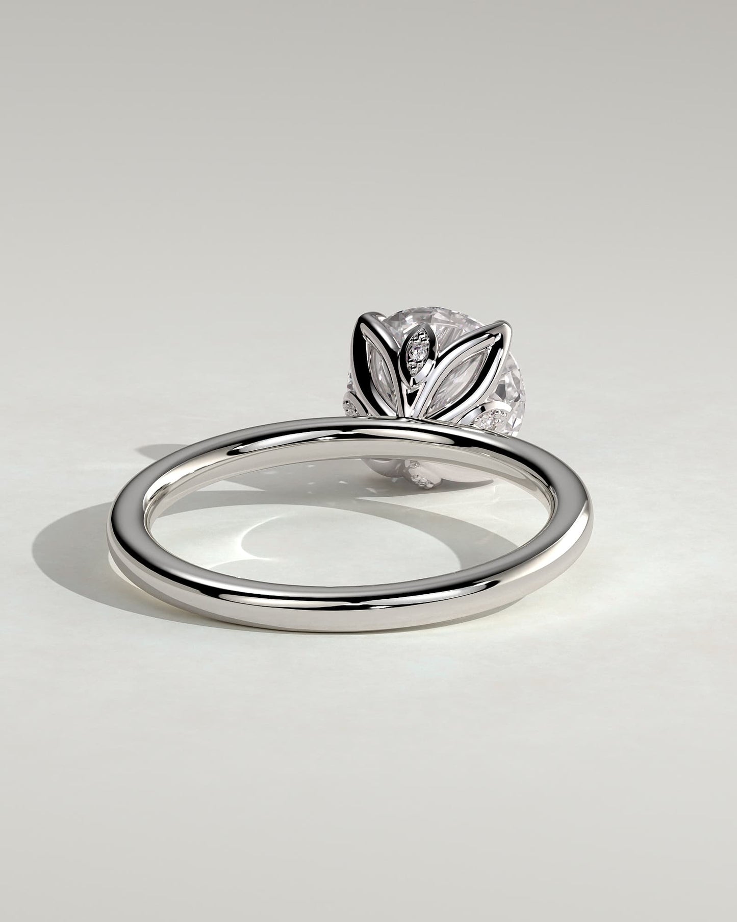 Joy - Round Claw Solitaire with Petal Gallery and Accent Leaf Detail Engagement Ring - Platinum