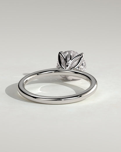 Brianna - Round Claw Solitaire with Petal Gallery, Accent Leaf Detail and Cathedral Setting Engagement Ring - Platinum