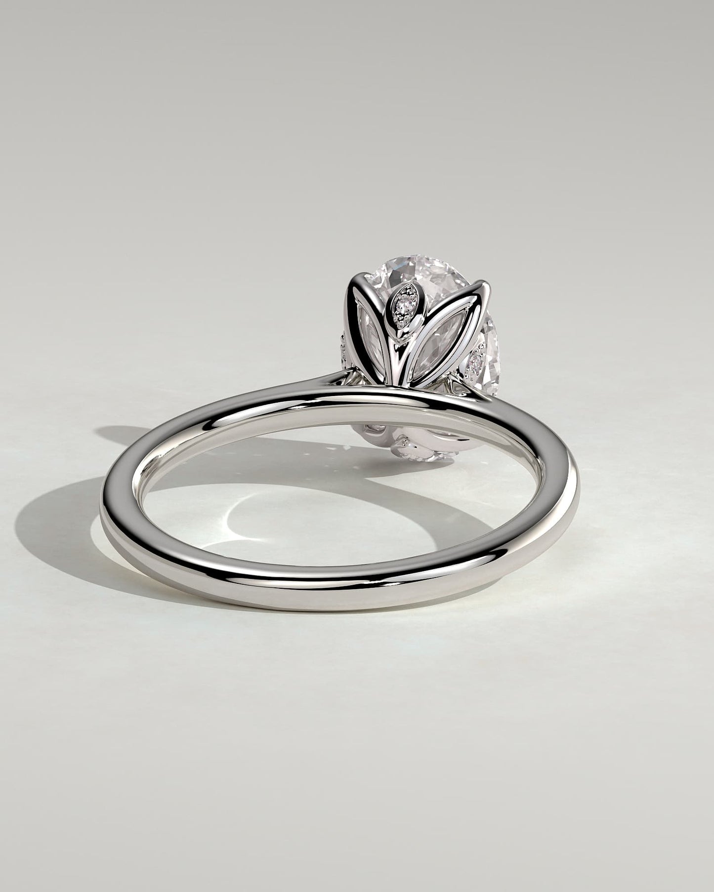 Erica - Oval Claw Solitaire with Petal Gallery, Accent Leaf Detail and Cathedral Setting Engagement Ring - White Gold
