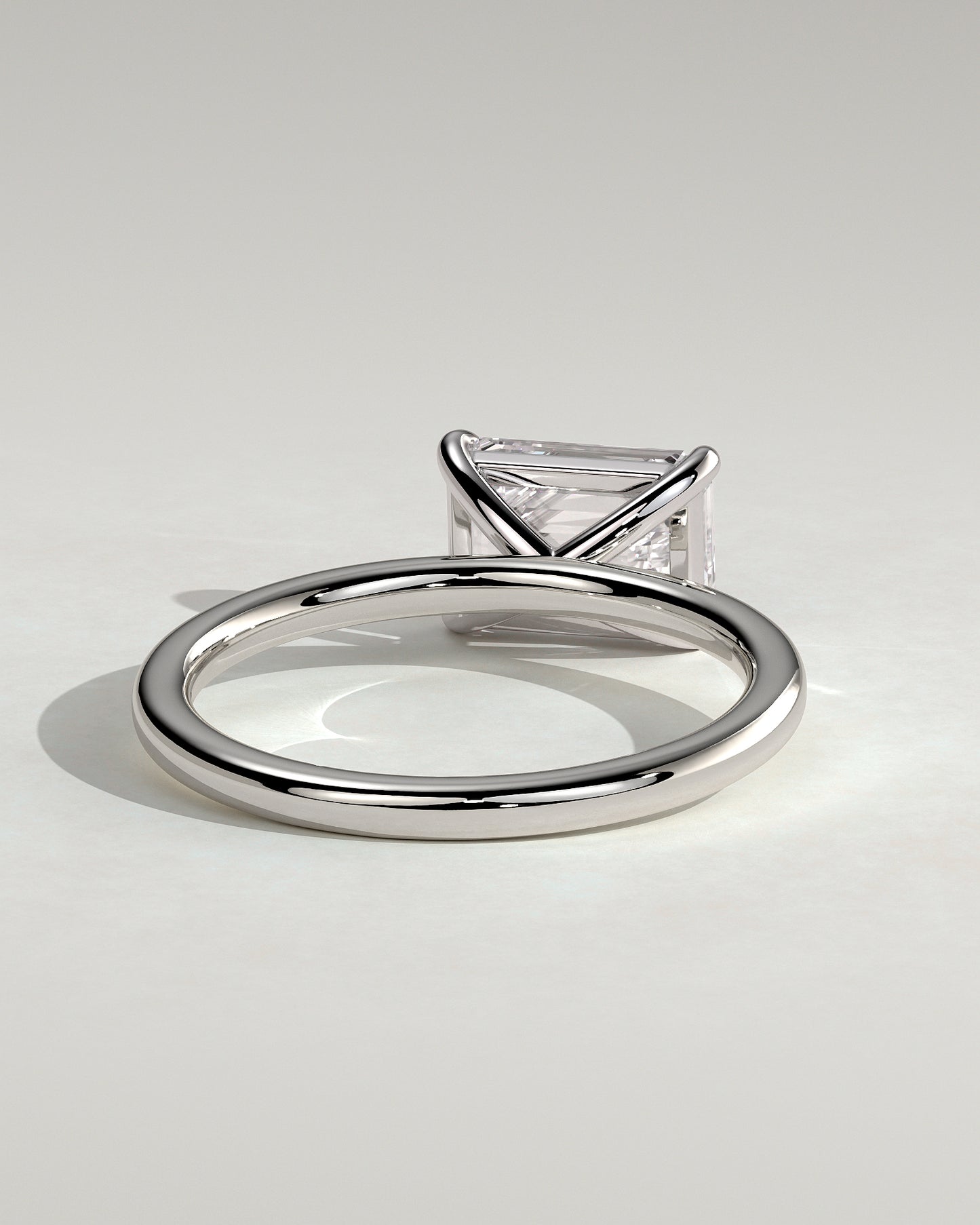 Debbie - Emerald East West Claw Solitaire Engagement Ring - Platinum - White Gold / Platinum 2ct