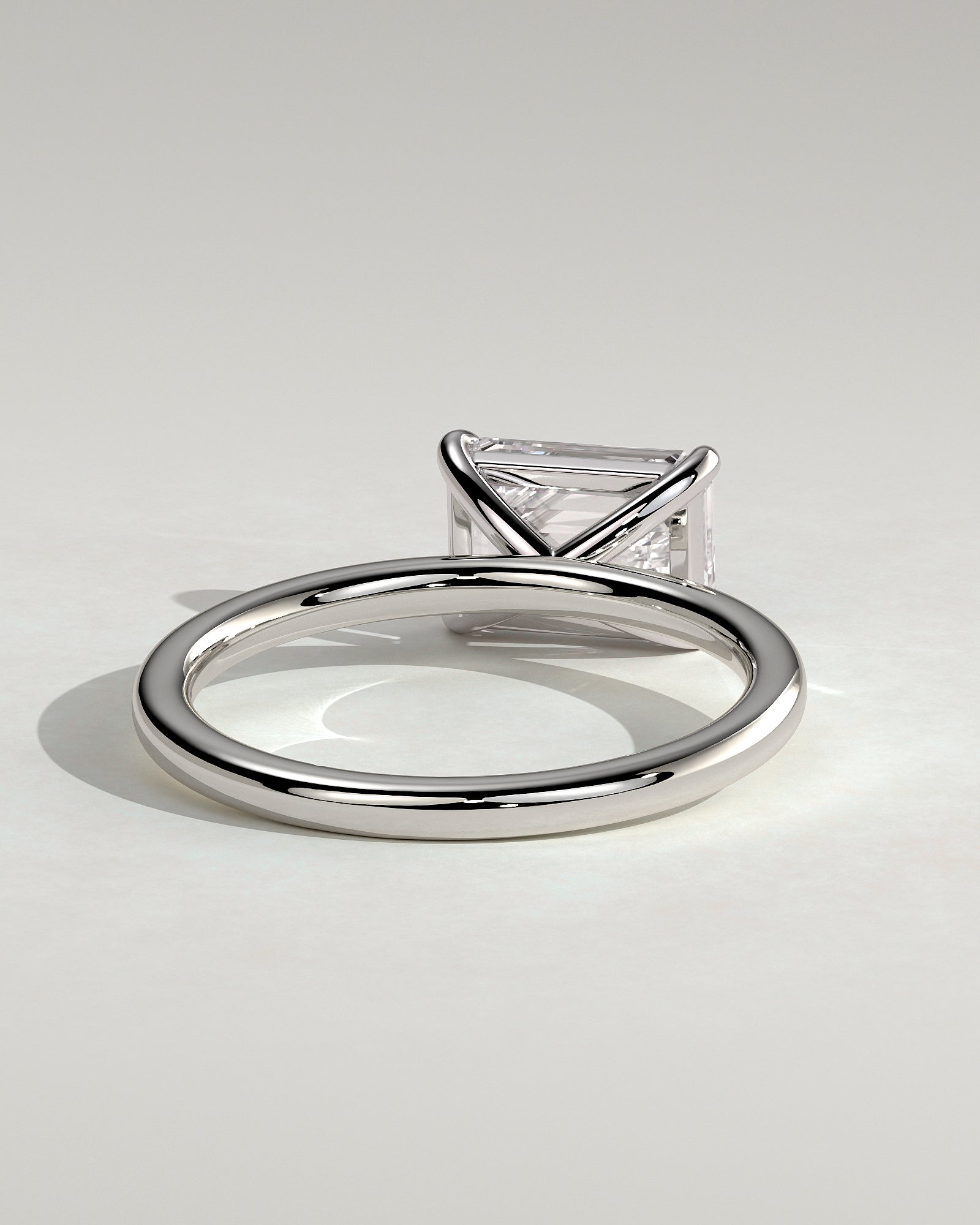 Debbie - Emerald East West Claw Solitaire Engagement Ring - Platinum - White Gold / Platinum 2ct