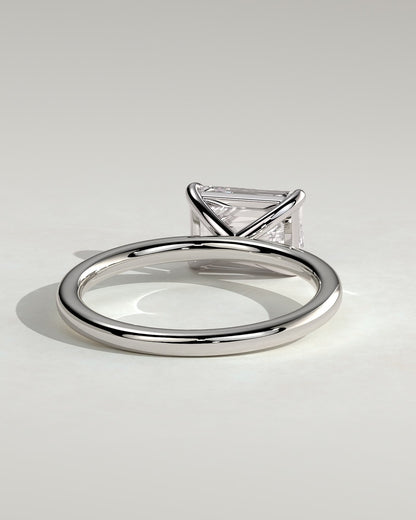 Debbie - Emerald East West Claw Solitaire Engagement Ring - Platinum