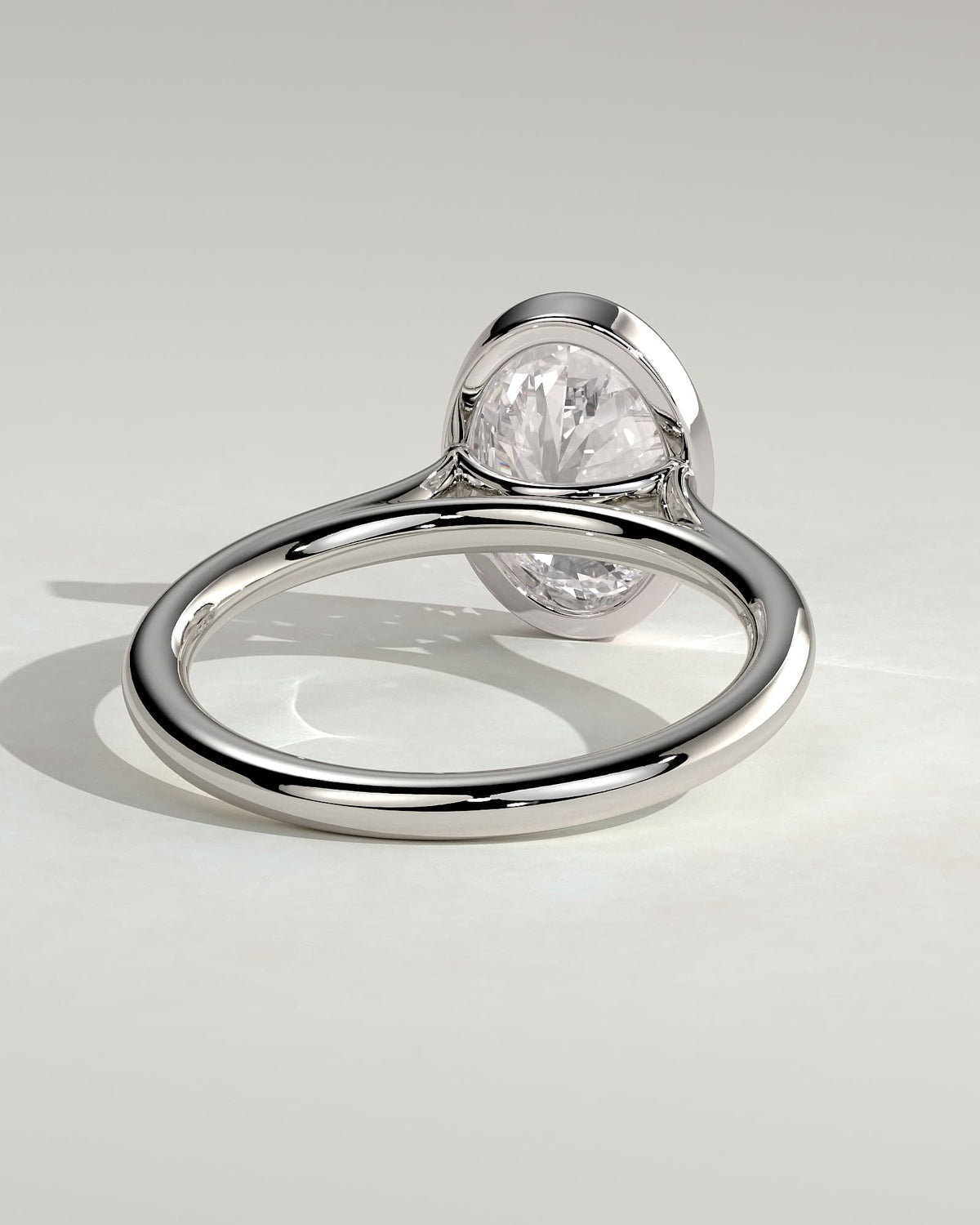 Daphne - Oval Bezel Solitaire with Cathedral High Setting Engagement Ring - White Gold