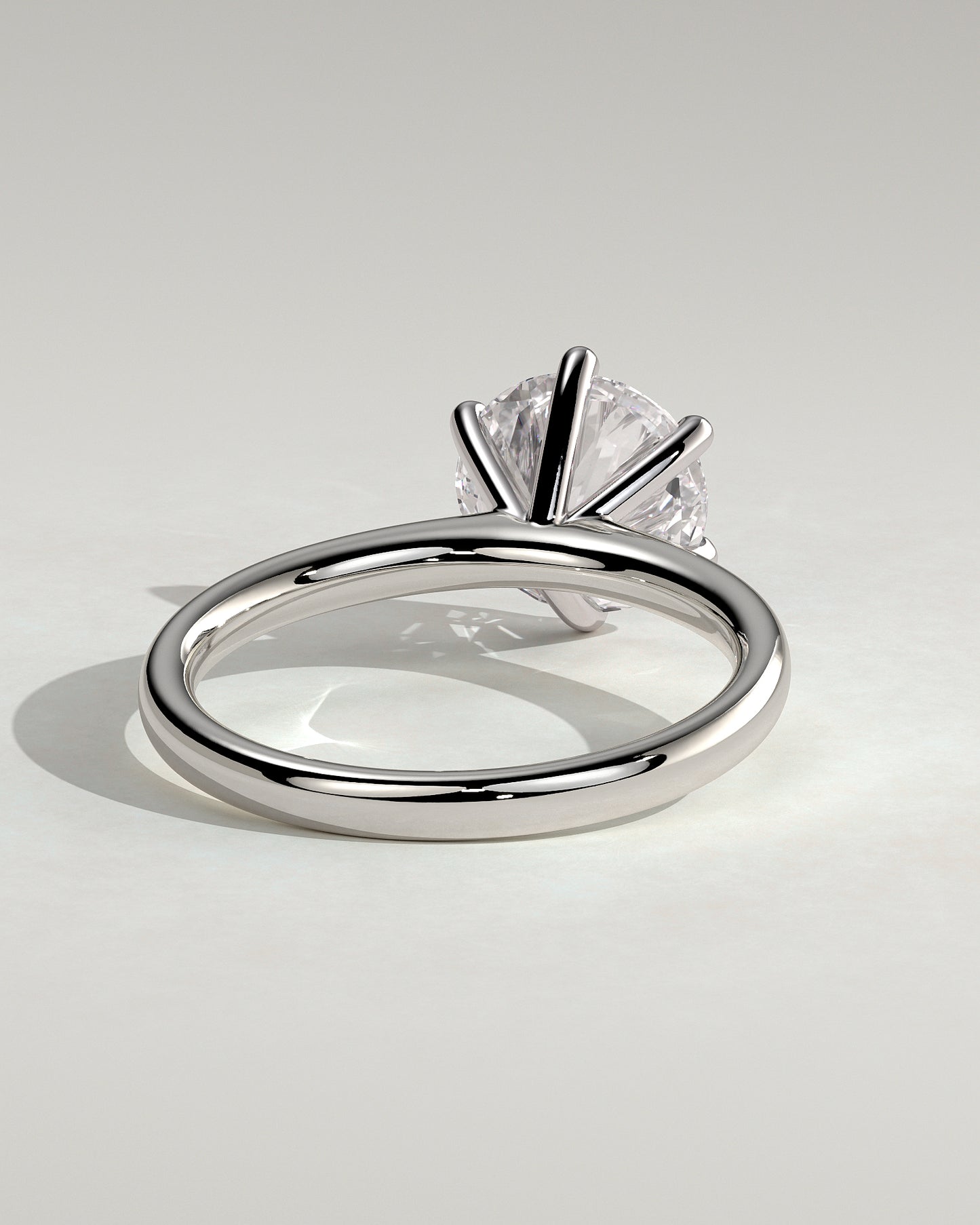 Daniela - Round Claw Solitaire with Solid Cathedral High Setting Engagement Ring - Platinum - White Gold / Platinum 2ct