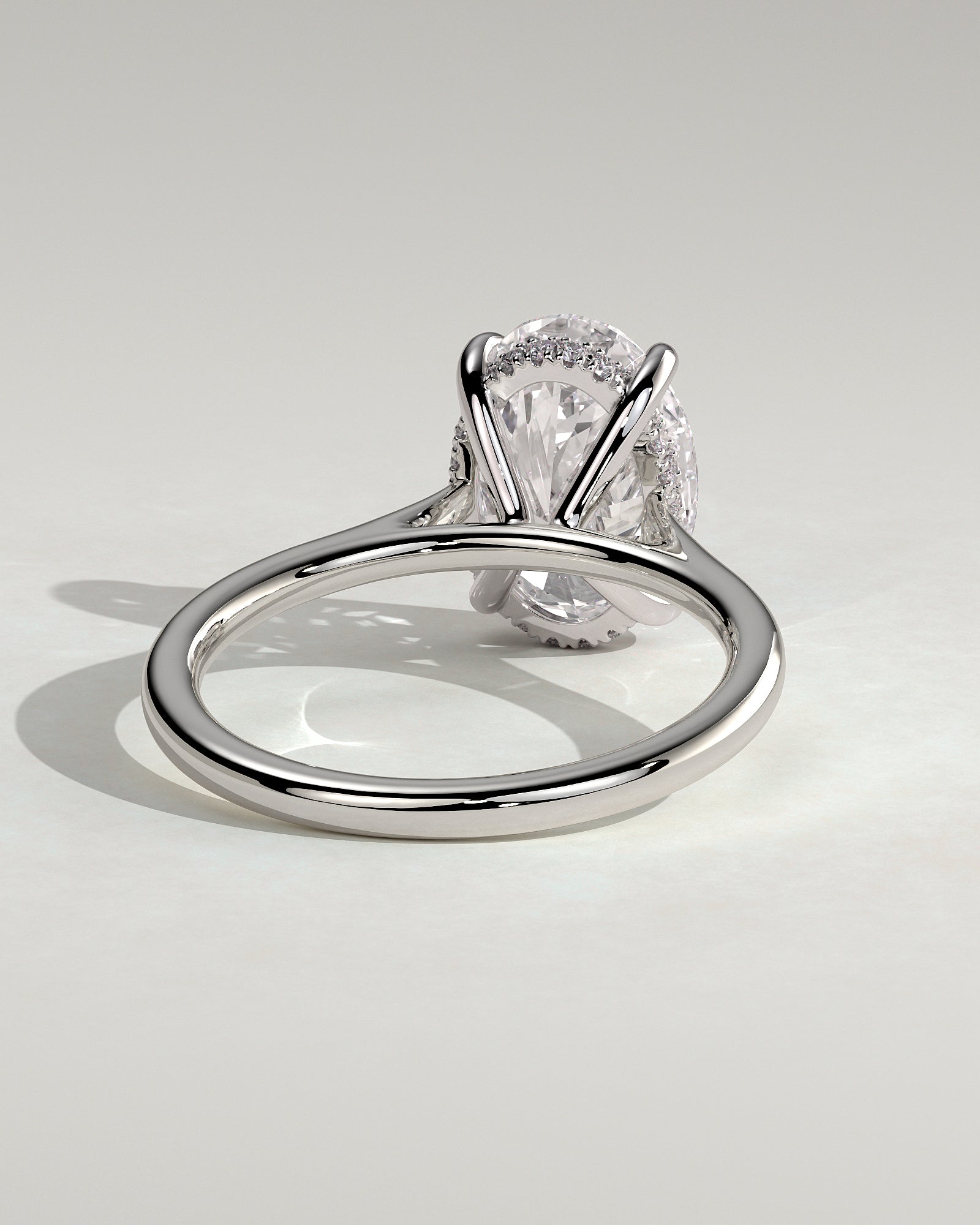 Bethany - Oval Claw Solitaire with Hidden Halo, Tapered Band and Cathedral High Setting Engagement Ring - Platinum - White Gold / Platinum 2ct