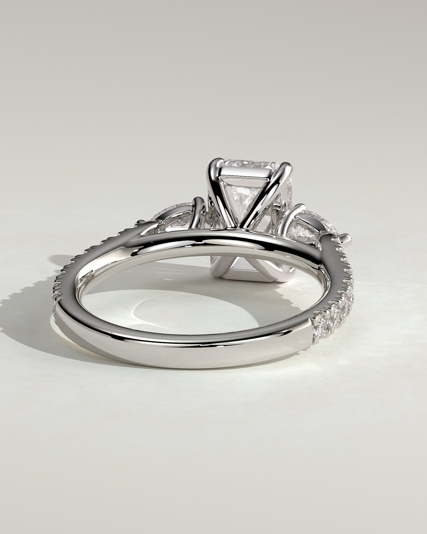 Autumn - Emerald Claw Trilogy with Pear Side Stones and Pave Band Engagement Ring - White Gold