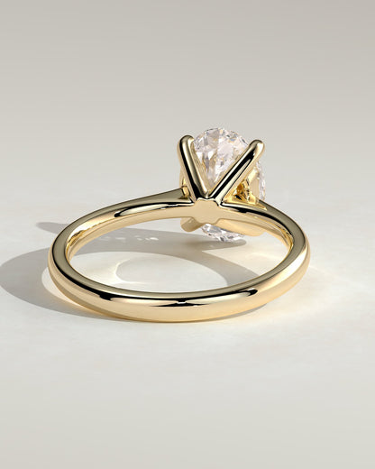 Emily - Oval Claw Solitaire with Pinched Tapered Band and Cathedral Low Setting Engagement Ring - Yellow Gold