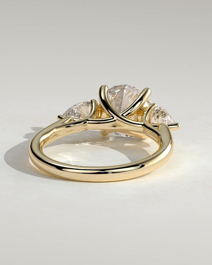 Adelyn - Round Claw Trilogy with Pear Side Stones and Open Trellis Gallery Engagement Ring - Yellow Gold