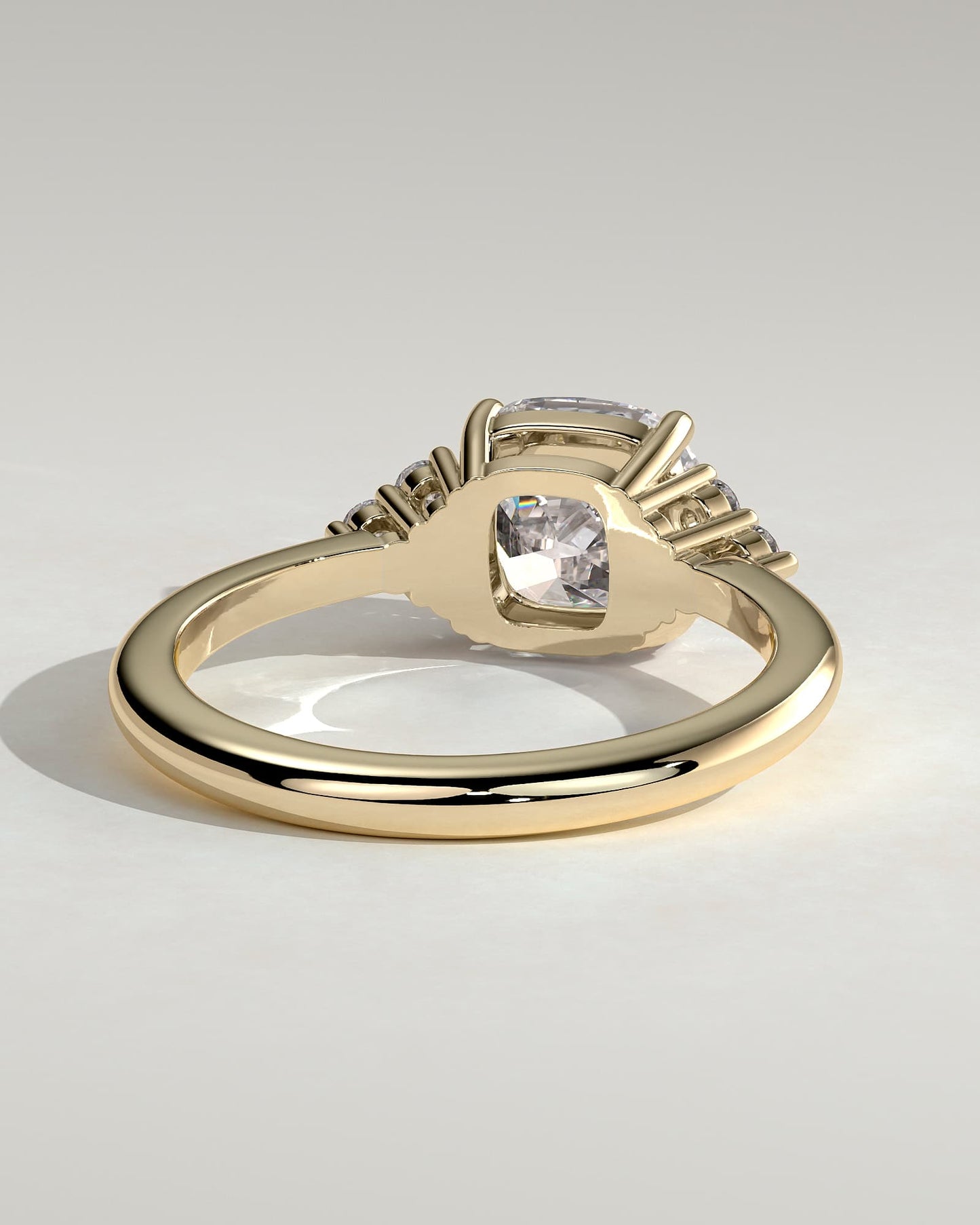Lena - Cushion Claw Solitaire with Round Shoulder Stones Engagement Ring - Yellow Gold