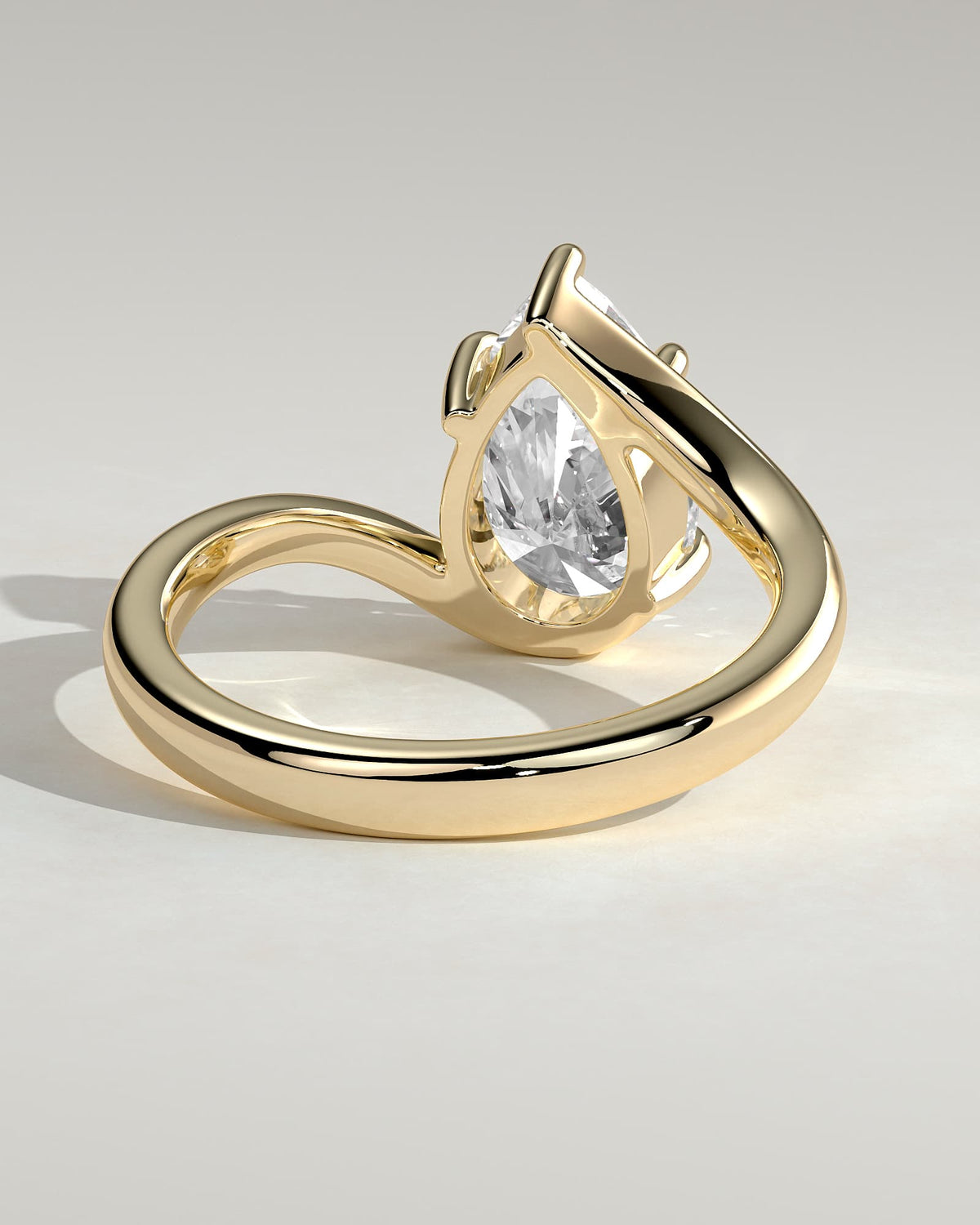 Jennifer - Pear Claw Solitaire with Bypass Band Engagement Ring - Yellow Gold