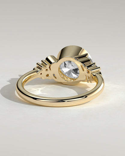Alessia - Round Bezel Solitaire with Clustered Round-Marquise Mixed Set Shoulder Stones Engagement Ring - Yellow Gold