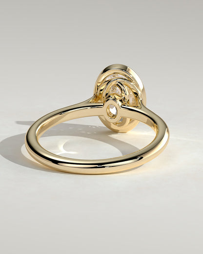 Gemma - Oval Bezel Solitaire with Twisted Gallery Engagement Ring - Yellow Gold