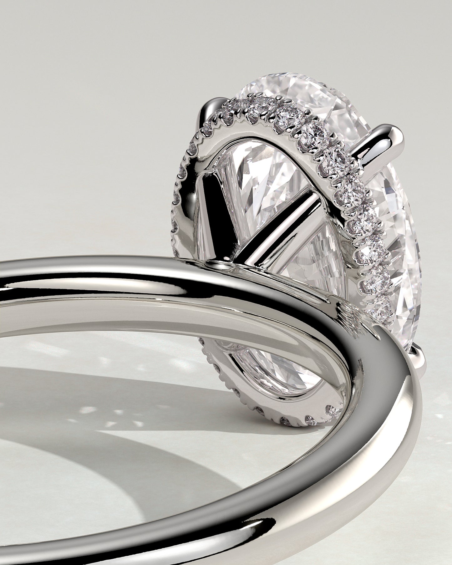 Cecilia - Oval Claw Solitaire with Wrap Around Hidden Halo Engagement Ring - Platinum - White Gold / Platinum 2ct