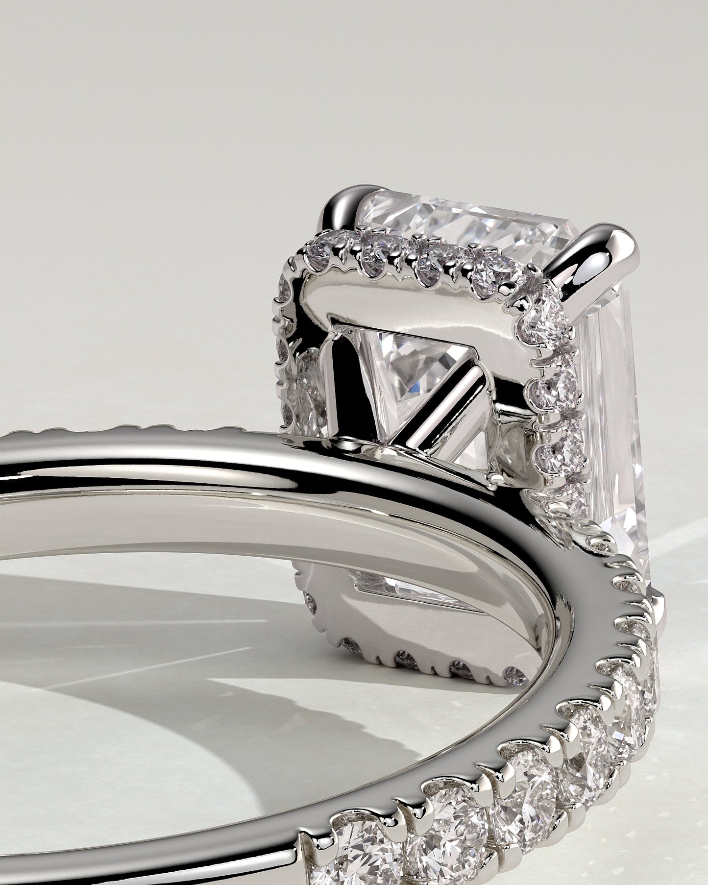 Eliana - Emerald Claw Solitaire with Wrap Around Hidden Halo and Pave Band Engagement Ring - Platinum - White Gold / Platinum 2ct