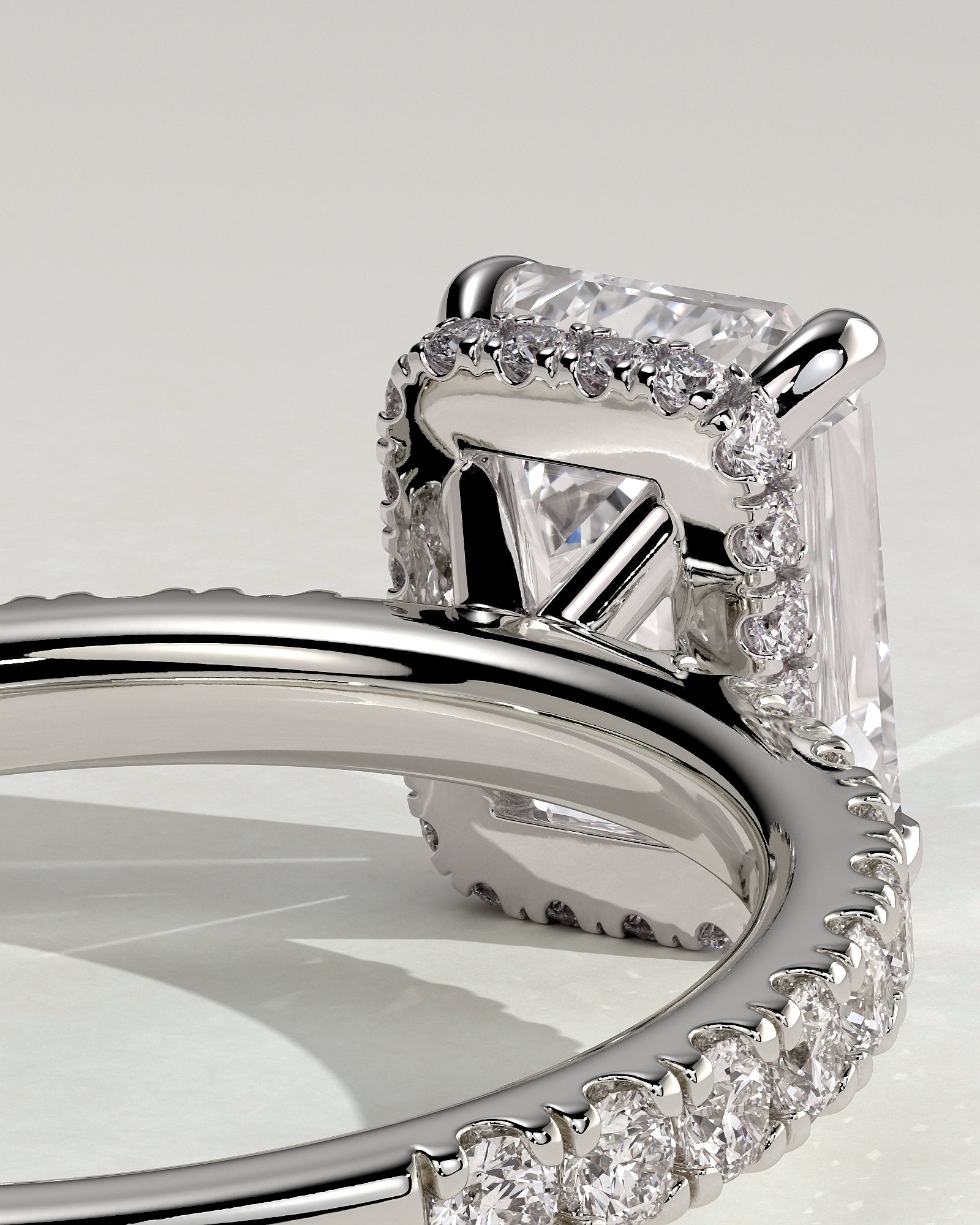 Eliana - Emerald Claw Solitaire with Wrap Around Hidden Halo and Pave Band Engagement Ring - Platinum - White Gold / Platinum 2ct