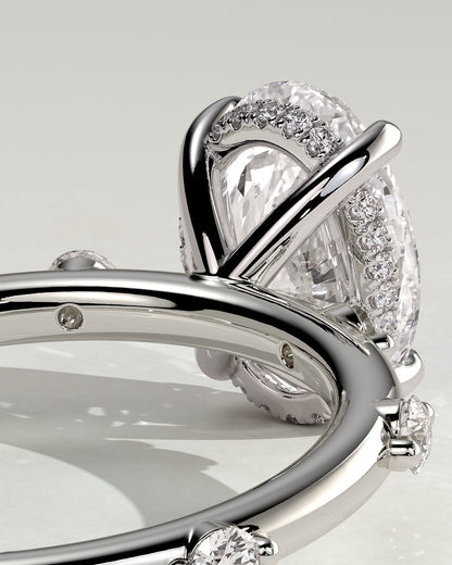 Elise - Oval Claw Solitaire with 6 Spaced Round Accent Stones and Hidden Halo Engagement Ring - Platinum