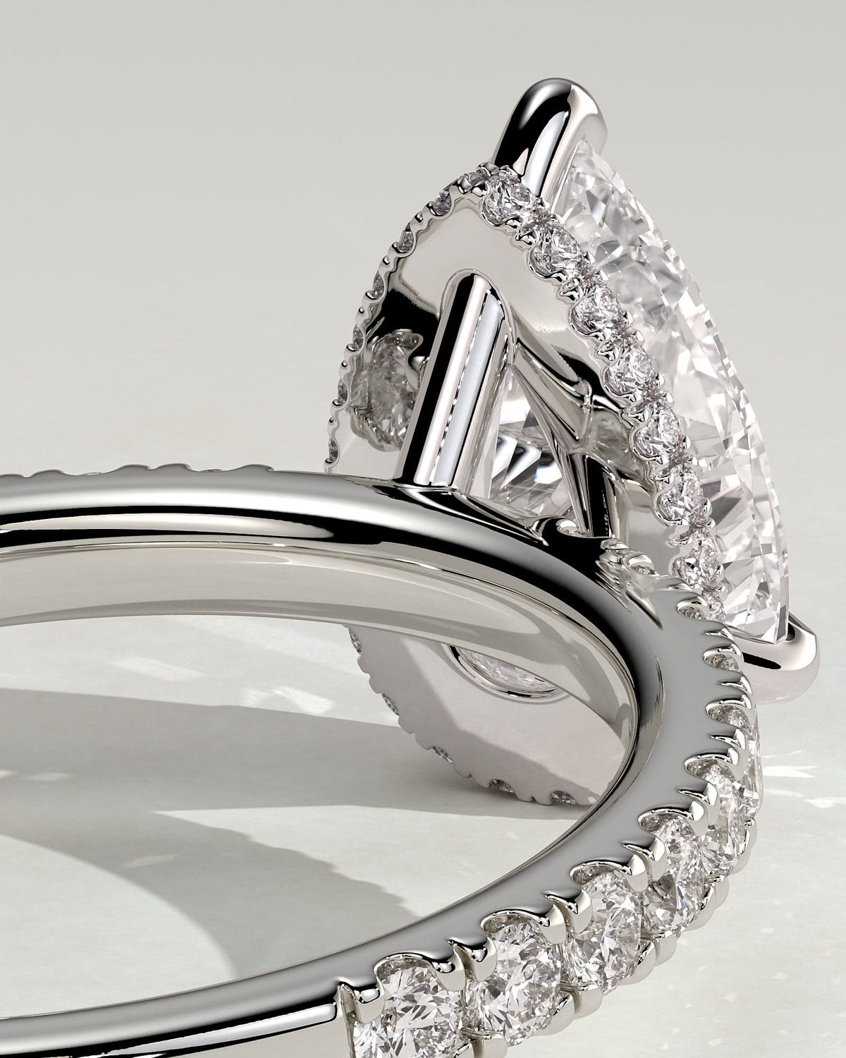 Keira - Pear Claw Solitaire with Wrap Around Hidden Halo and Pave Band Engagement Ring - White Gold