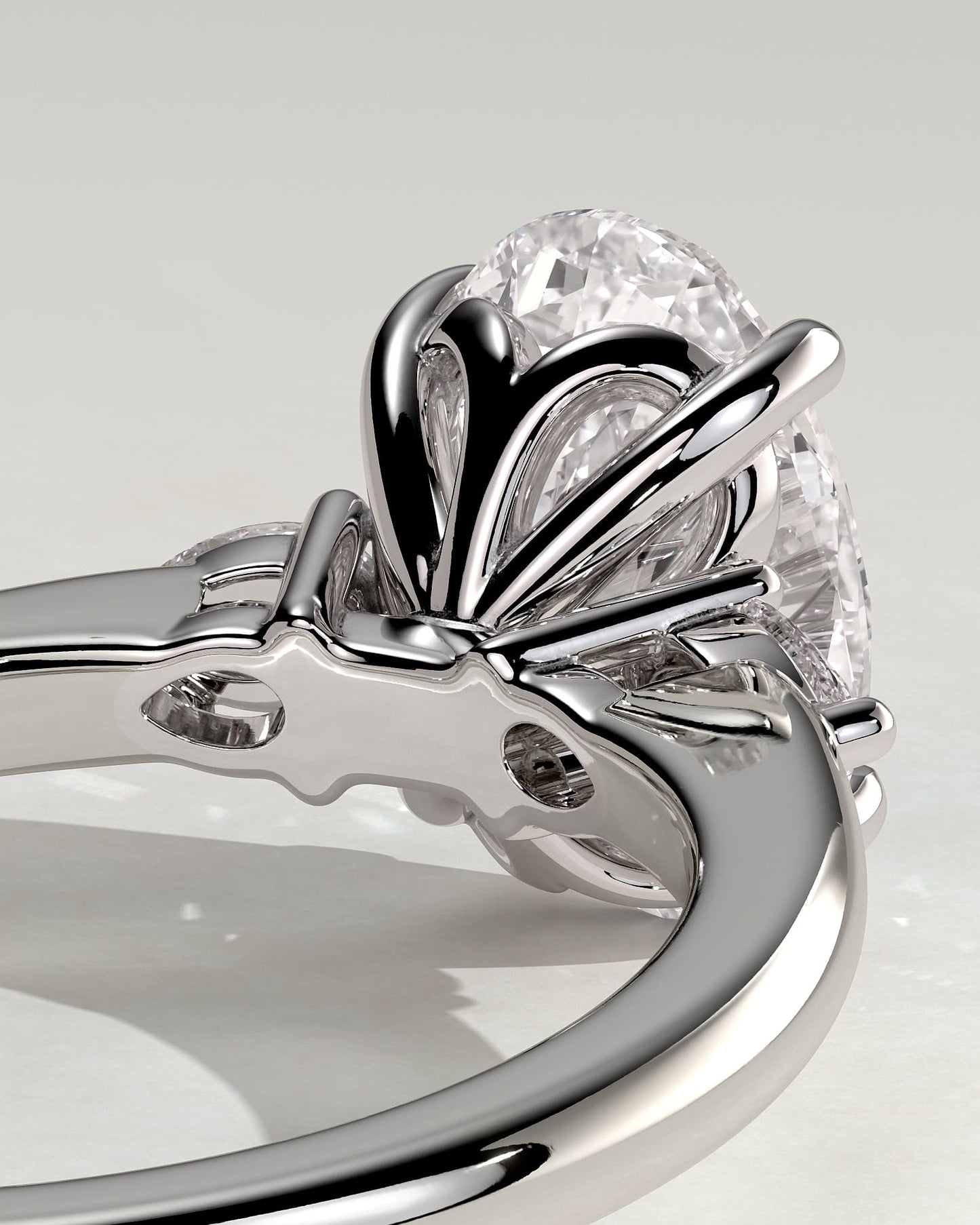 Elena - Oval Claw Trilogy with Pear Side Stones and Tulip Detail Engagement Ring - White Gold