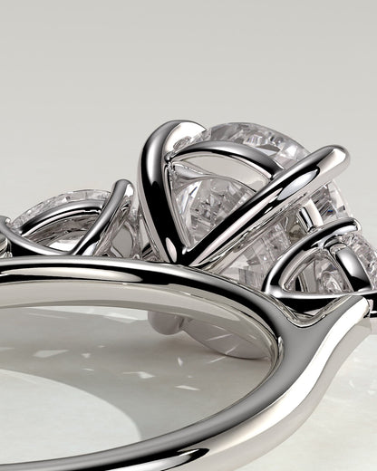 Arya - Round Claw Trilogy with Pear Side Stones and Cathedral Setting Engagement Ring - Platinum