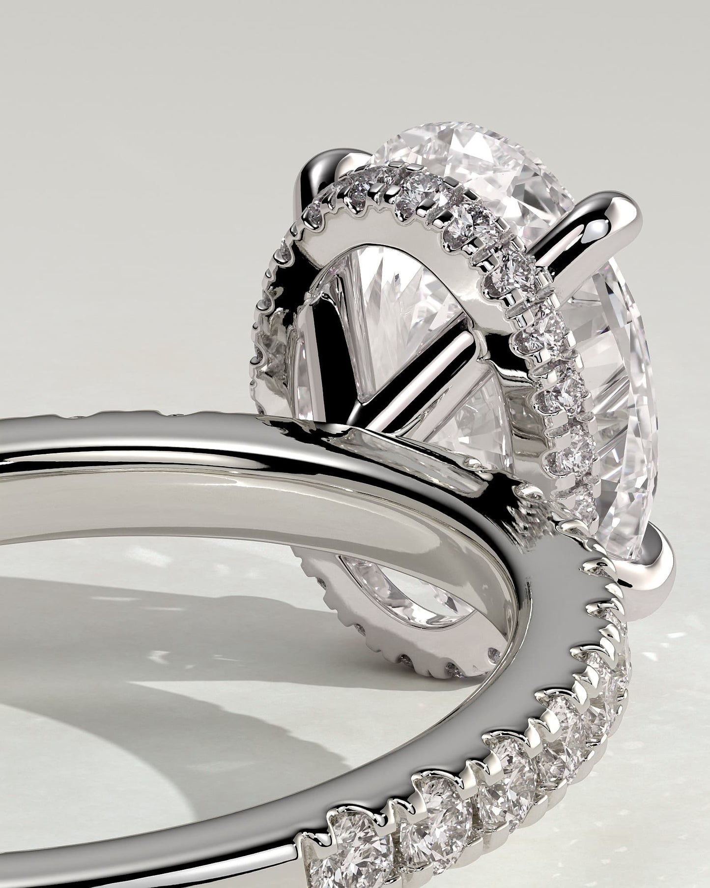 Evangeline - Oval Claw Solitaire with Wrap Around Hidden Halo and Pave Band Engagement Ring - White Gold
