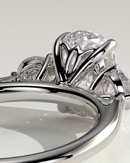 Charmaine - Elongated Cushion Claw Trilogy with Round Side Stones and Lily Detail Engagement Ring - White Gold