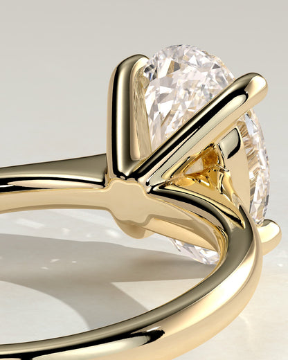 Emily - Oval Claw Solitaire with Pinched Tapered Band and Cathedral Low Setting Engagement Ring - Yellow Gold
