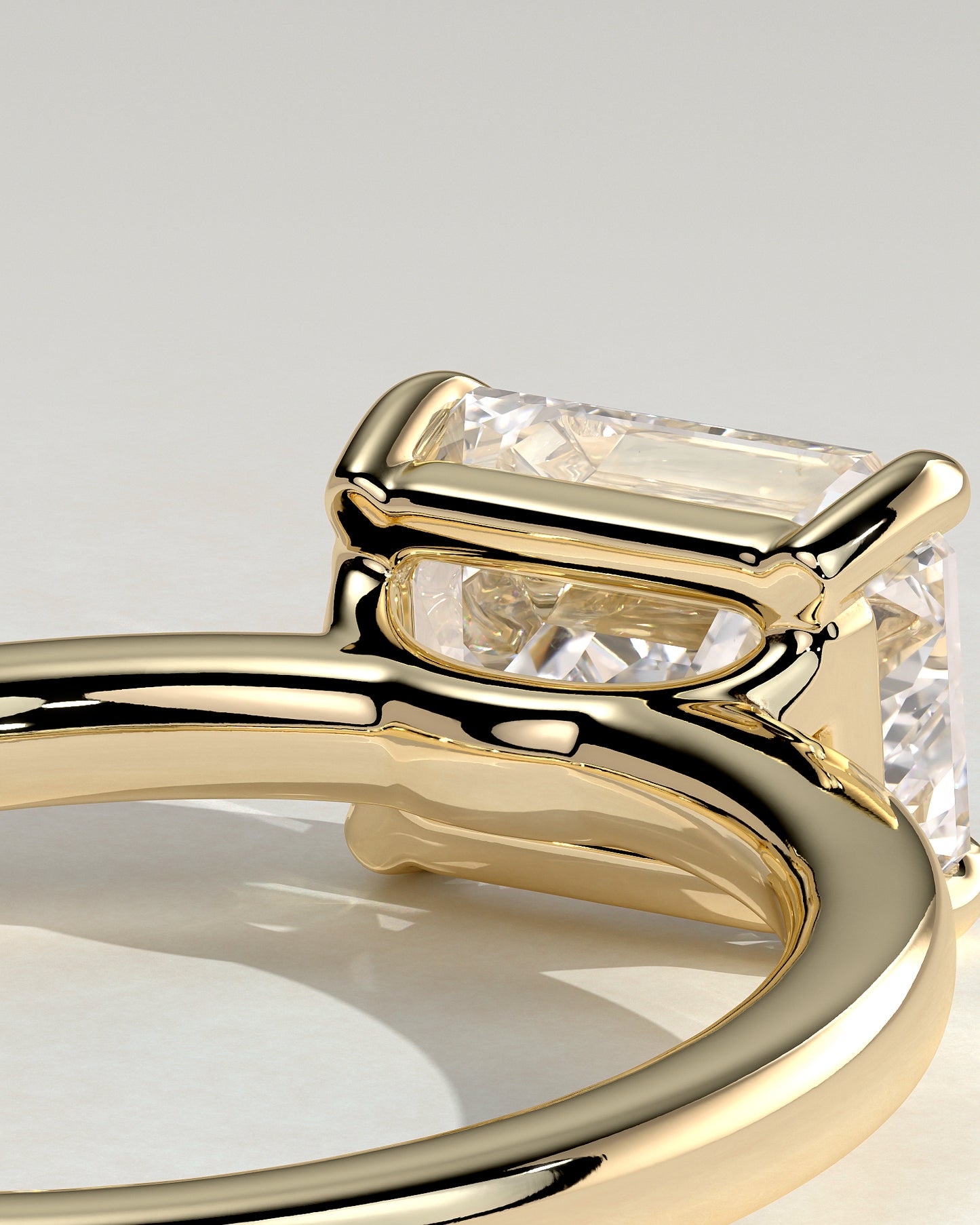 Evelyn - Emerald East West Claw Solitaire with Raised Basket Gallery Engagement Ring - Yellow Gold - Yellow Gold 2ct