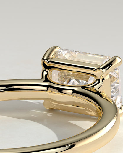 Evelyn - Emerald East West Claw Solitaire with Raised Basket Gallery Engagement Ring - Yellow Gold