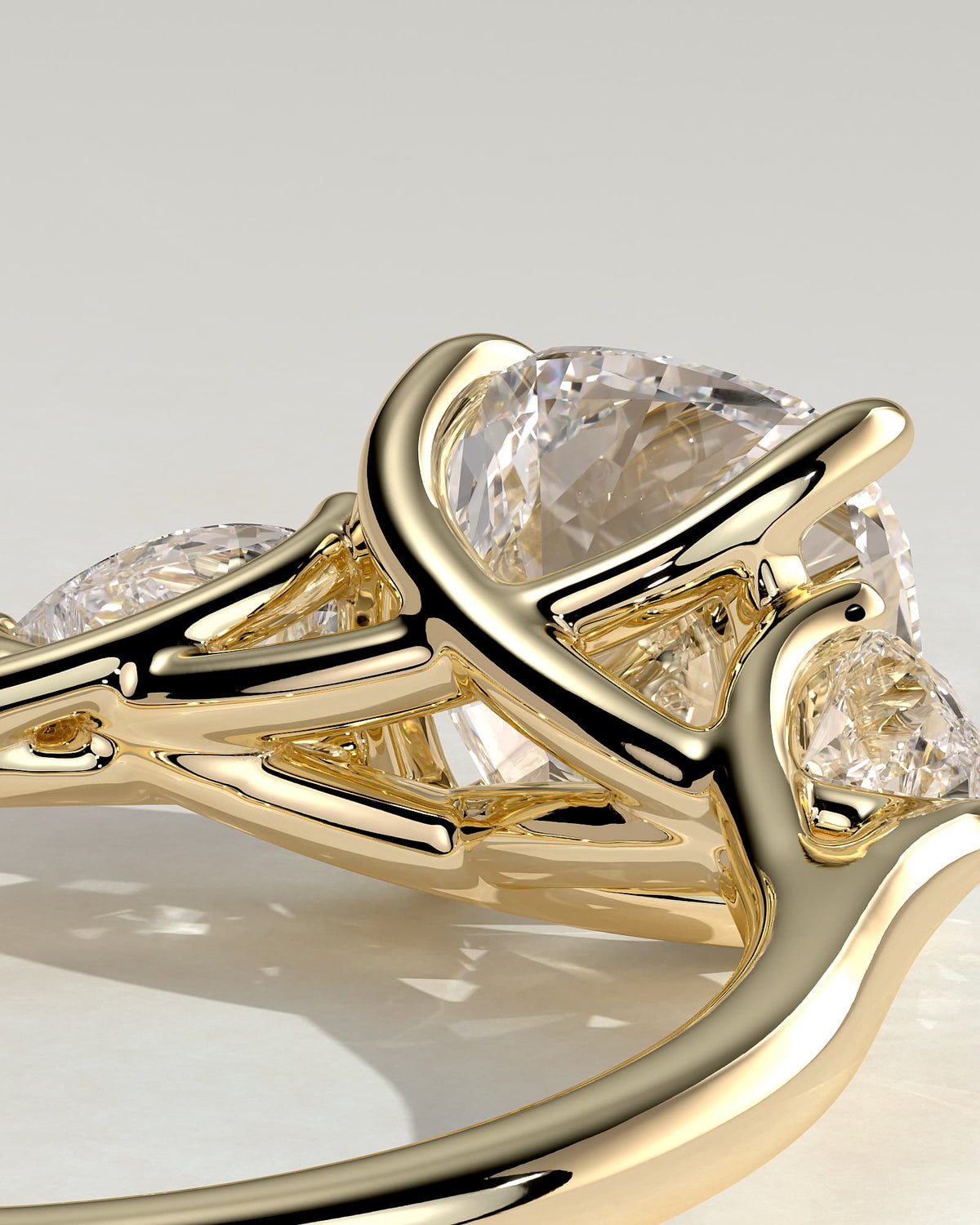 Selena - Cushion Claw Trilogy with Pear Side Stones and Open Trellis Gallery Engagement Ring - Yellow Gold