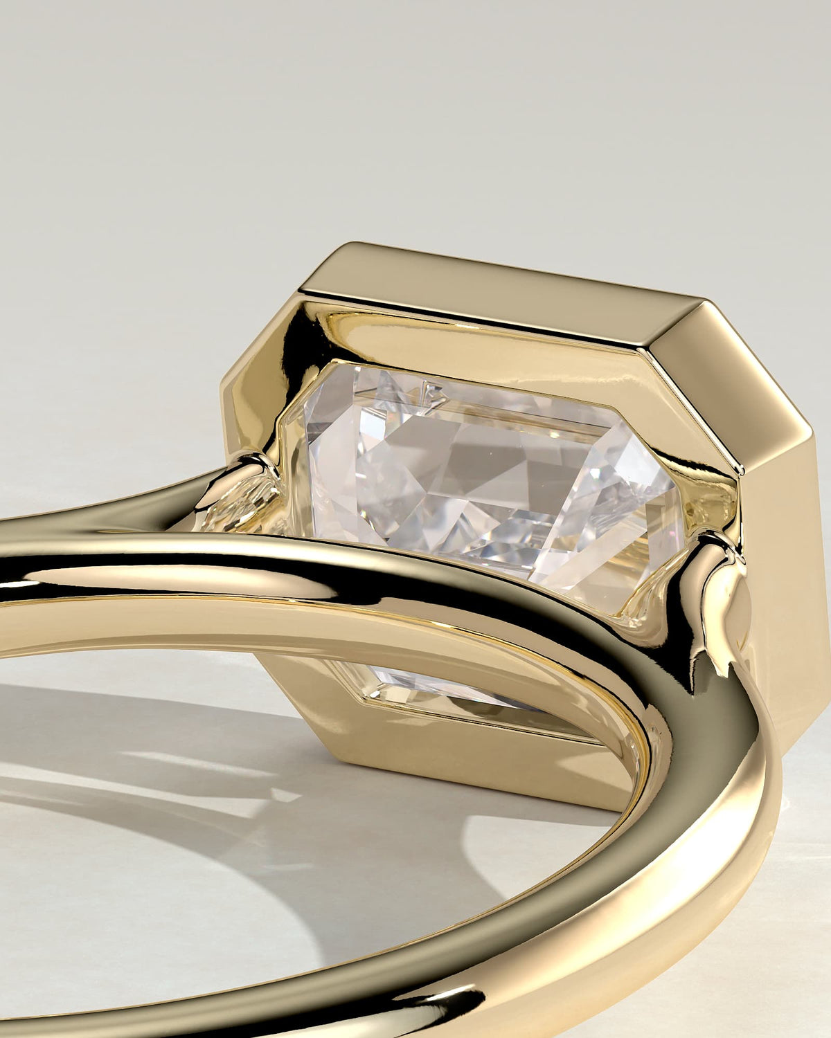 Olive - Statement Emerald East West Bezel Solitaire with Open Cathedral High Setting Engagement Ring - Yellow Gold