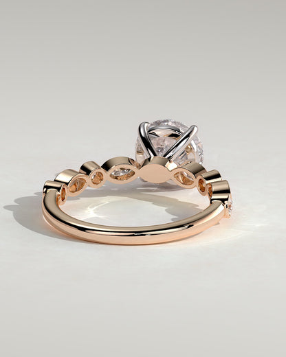 Cartia - Round Claw Solitaire with Round-Marquise Bezel Accent Stones Engagement Ring - Rose Two-Tone