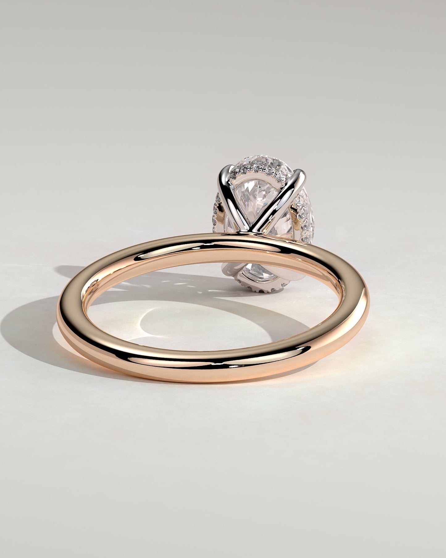 Emma - Classic Oval Claw Solitaire with Hidden Halo Engagement Ring - Rose Two-Tone