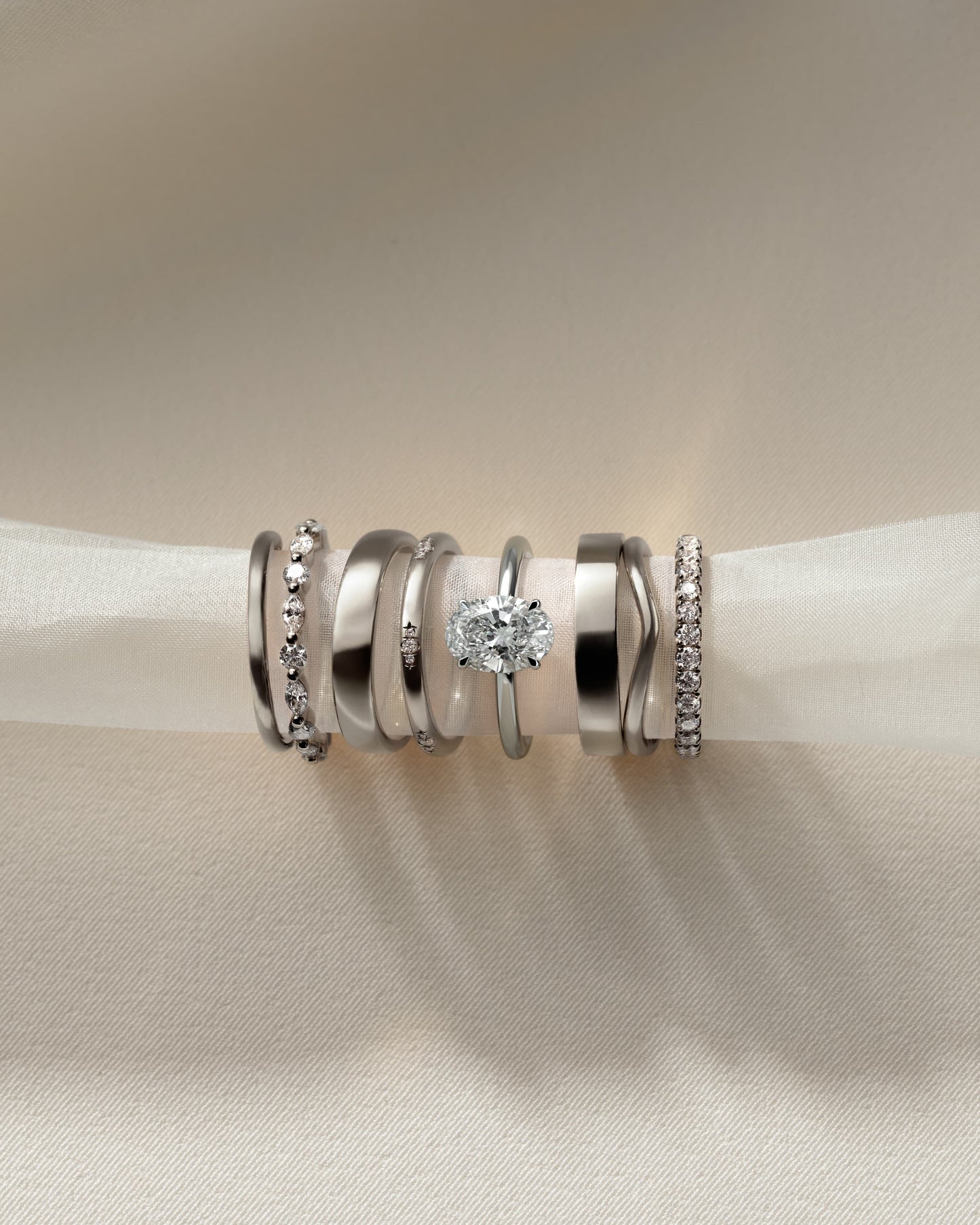 Cecilia - Oval Claw Solitaire with Wrap Around Hidden Halo Engagement Ring - White Gold